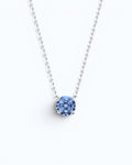 Pearlsstones octagonal rose cut tanzanite blue zircon pendant necklace in rhodium-plated sterling silver.