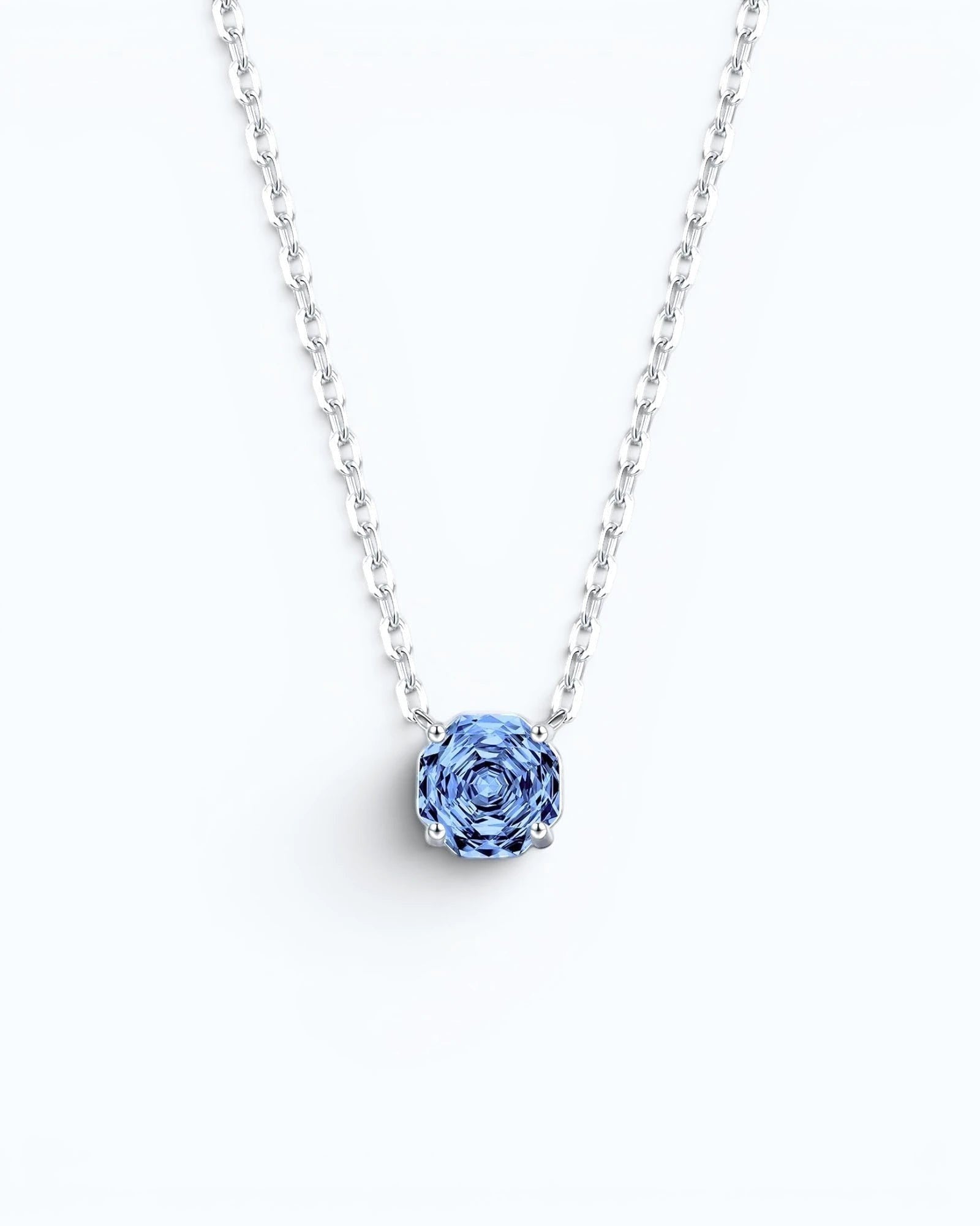 Pearlsstones octagonal rose cut tanzanite blue zircon pendant necklace in rhodium-plated sterling silver.
