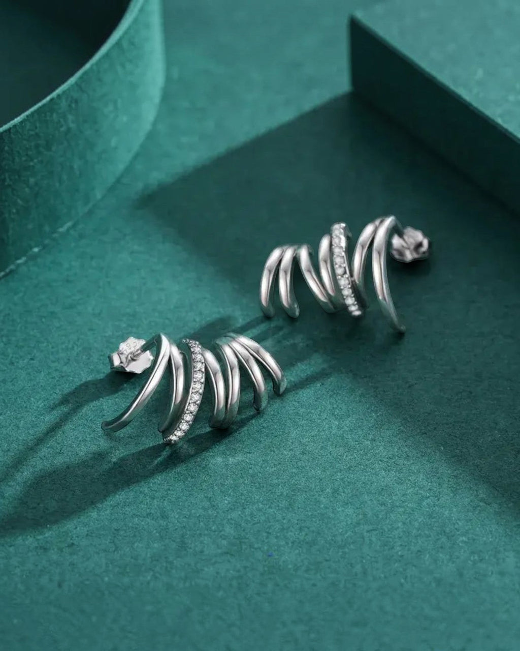 Pearlstones Zircon Line Ear Studs, 925 sterling silver with white gold plating, featuring a spiral design with small cubic zirconia stones.