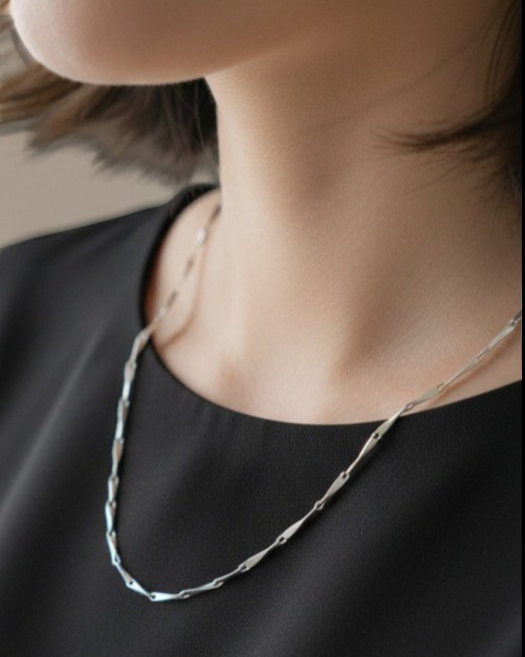 Pearlystones 1mm twisted dapped bar sterling silver chain with platinum plating. Delicate Italian-made necklace for layering.