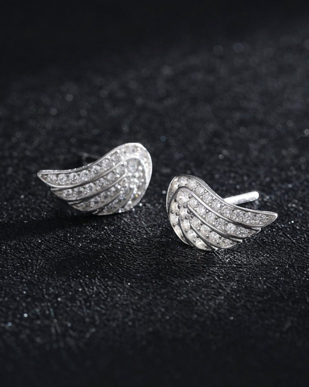 Pearlystones Angel Wing Stud Earrings with cubic zirconia in polished silver-tone metal.