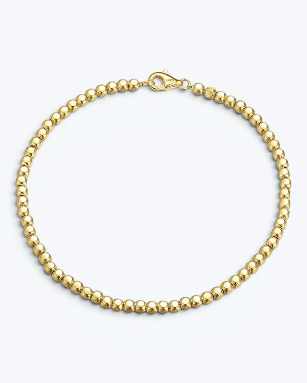 Pearlystones gold-tone beaded chain bracelet with a secure clasp. Delicate and elegant.