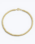 Pearlystones gold-tone beaded chain bracelet with a secure clasp. Delicate and elegant.