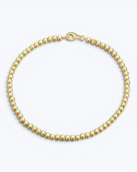 Pearlystones gold-tone beaded chain bracelet with a secure clasp. Delicate and elegant.