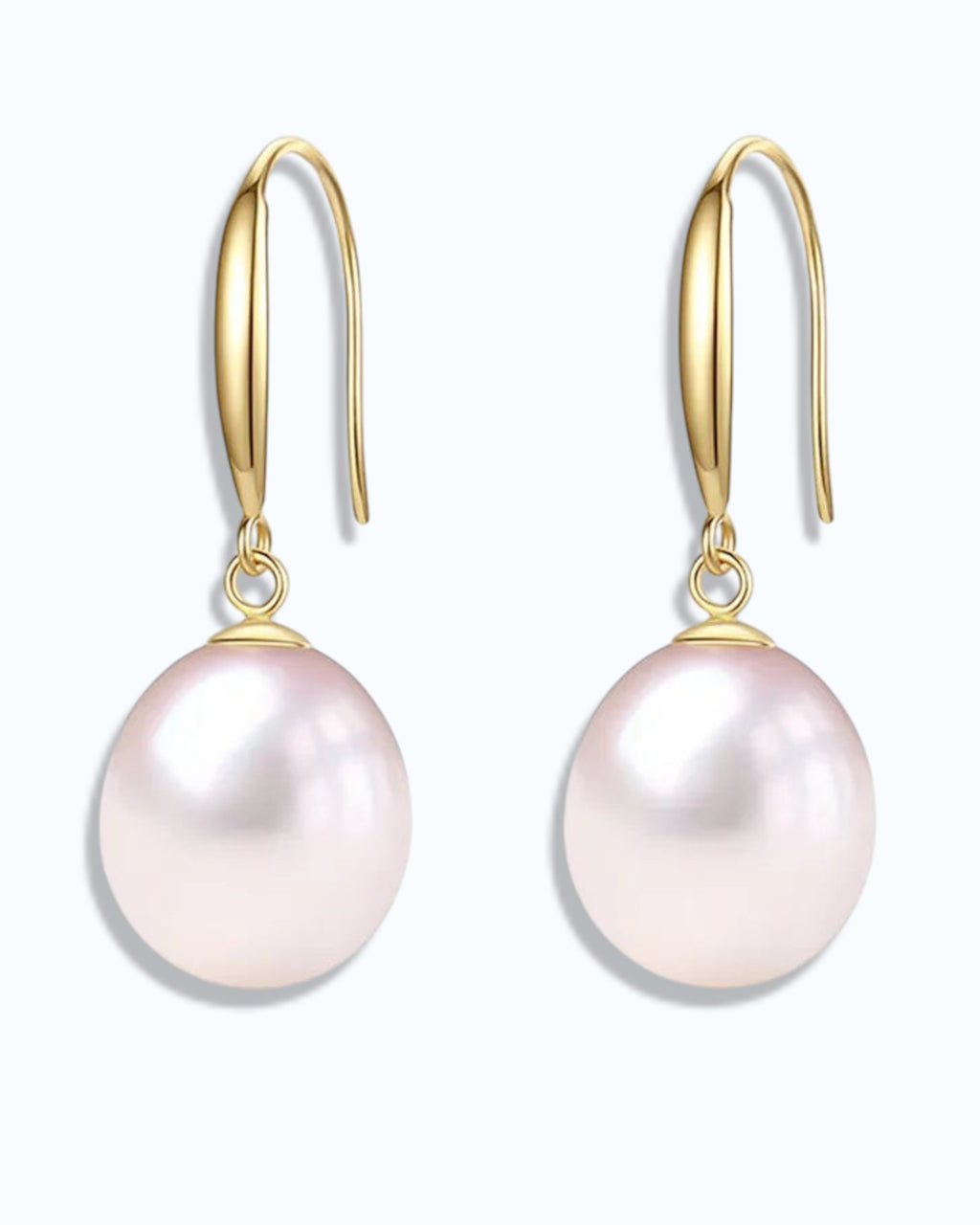Pearlystones classic white pearl drop earrings in gold-plated sterling silver. Elegant and timeless.