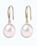 Pearlystones classic white pearl drop earrings in gold-plated sterling silver. Elegant and timeless.