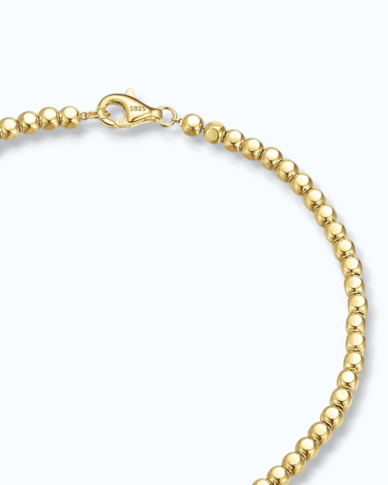 Pearlystones gold-tone beaded chain bracelet with a secure clasp, perfect for everyday wear or stacking.