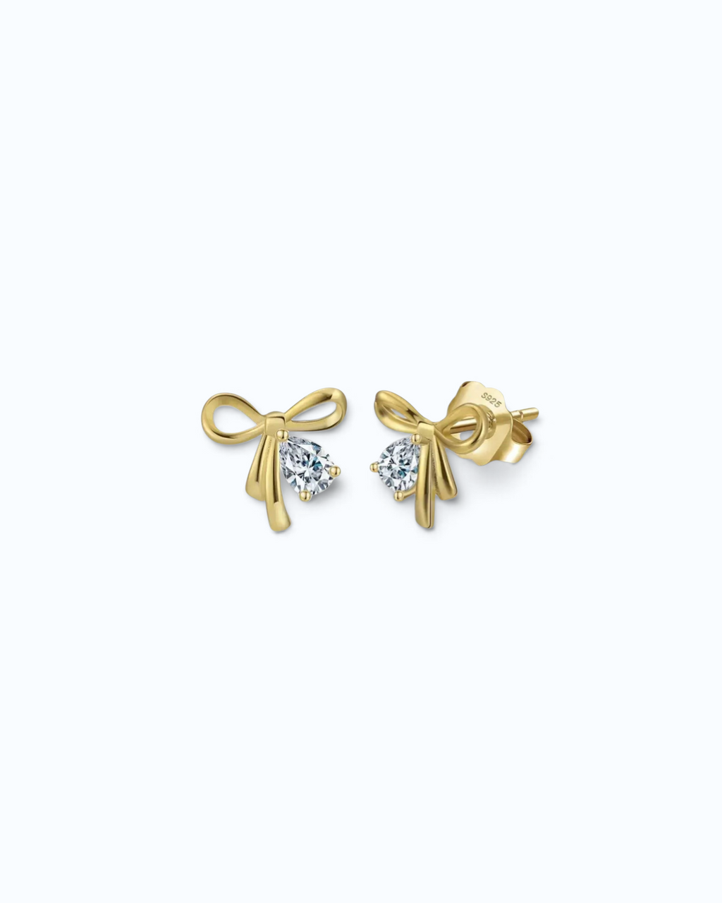 Pearlystones gold bowknot stud earrings with a sparkling pear-shaped crystal accent and S925 hallmark.