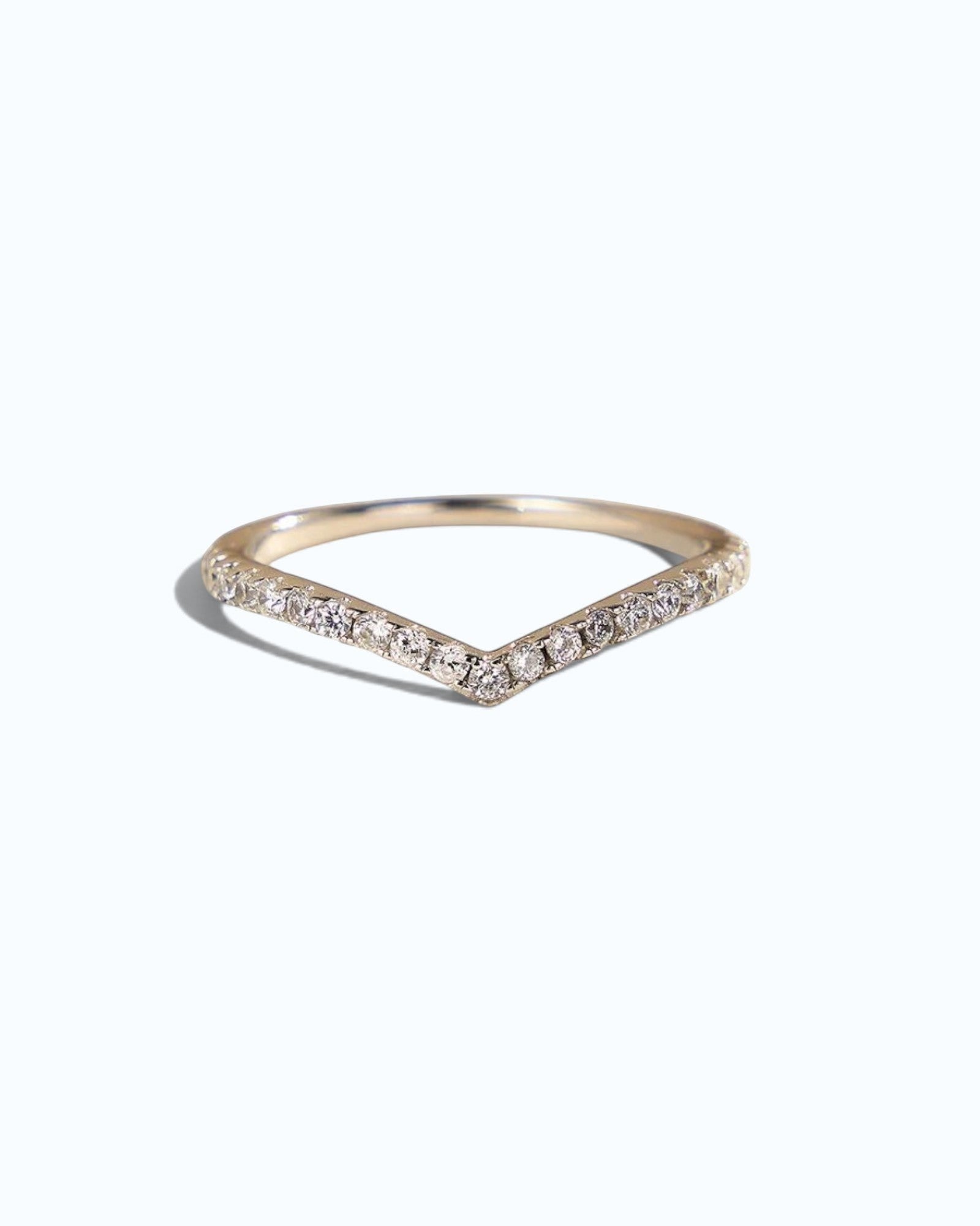 Pearlystones gold chevron ring with pavé-set zircon stones on a delicate V-shaped 925 sterling silver band.