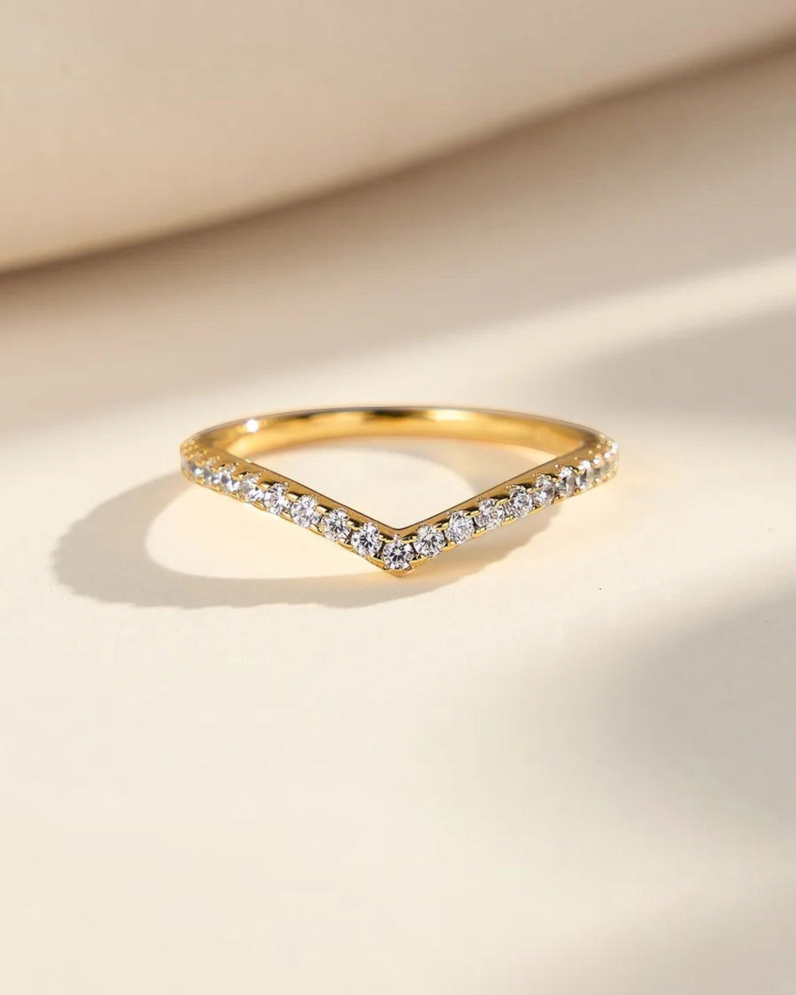 Pearlystones gold chevron ring with pavé-set zircon stones on a 925 sterling silver band