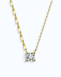 Pearlystones gold-plated sterling silver necklace featuring a brilliant-cut cubic zirconia pendant on a dapped chain.