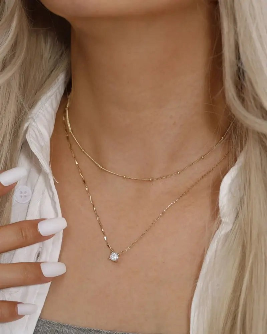 Pearlystones gold plated sterling silver necklace with a cubic zirconia pendant and delicate dapped bar chain