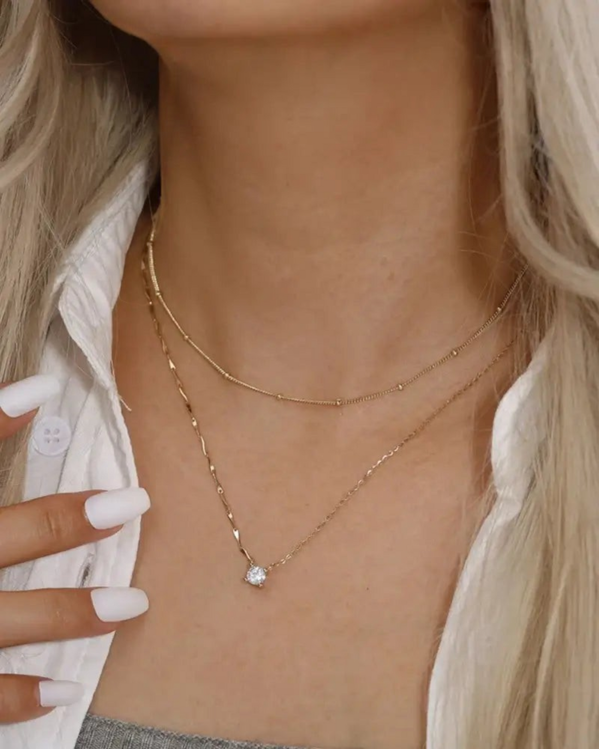 Pearlystones gold plated sterling silver necklace with a cubic zirconia pendant and delicate dapped bar chain