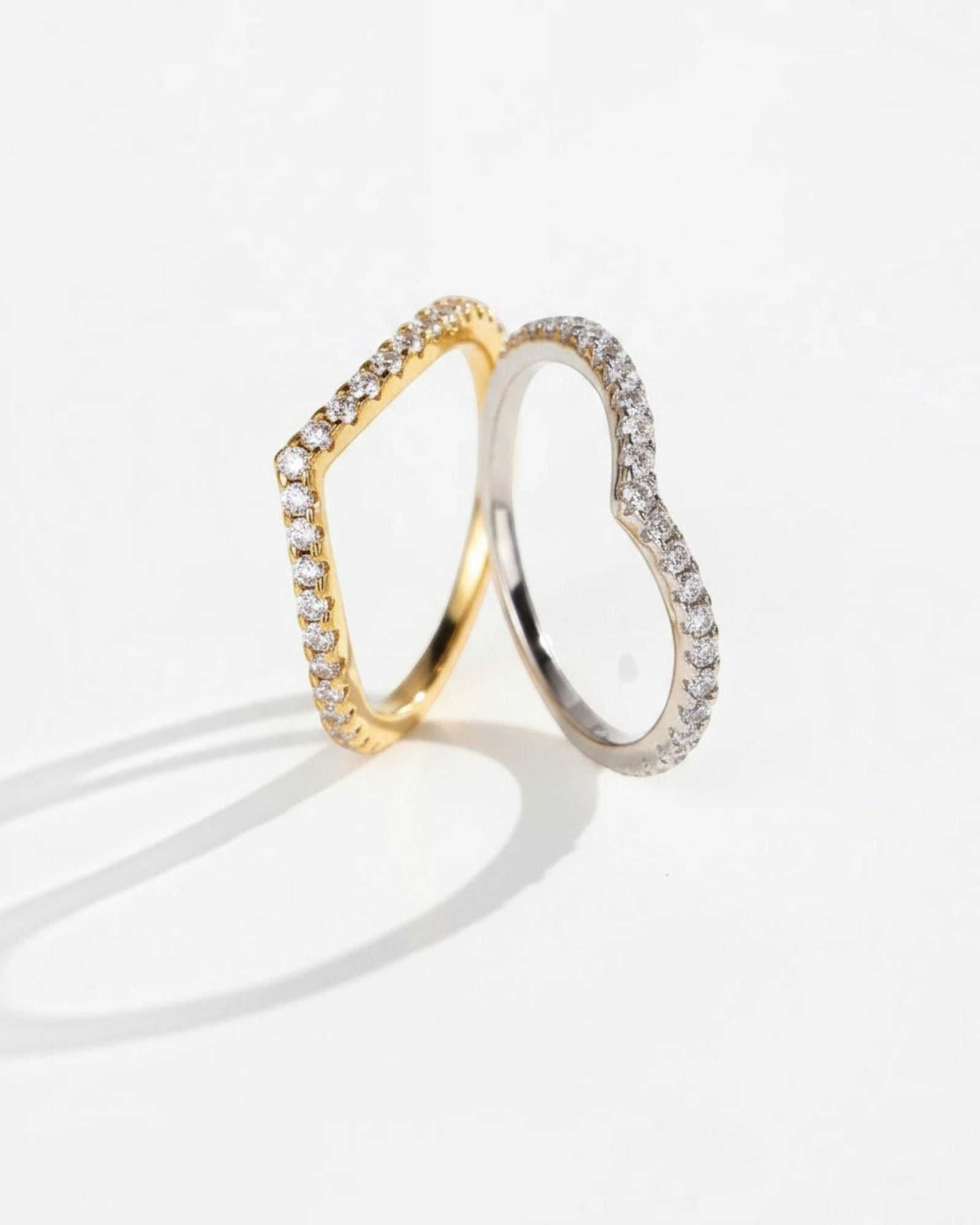 Pearlystones chevron rings in gold and silver sterling silver with pavé-set zircon stones for stacking.