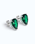 Pearlystones green cubic zirconia water droplet stud earrings in a minimalist silver setting on a white background.