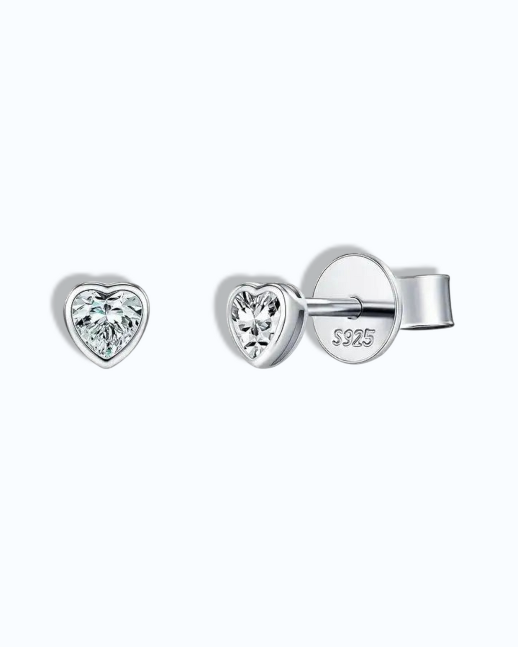Pearlystones 5mm heart-shaped moissanite stud earrings in rhodium-plated sterling silver with a clean bezel setting.