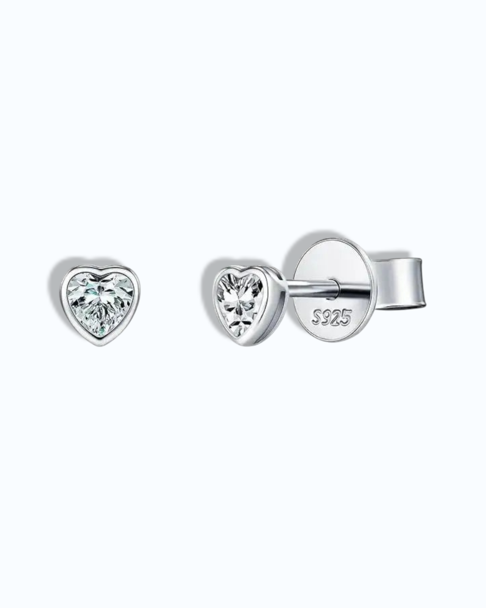 Pearlystones 5mm heart-shaped moissanite stud earrings in rhodium-plated sterling silver with a clean bezel setting.