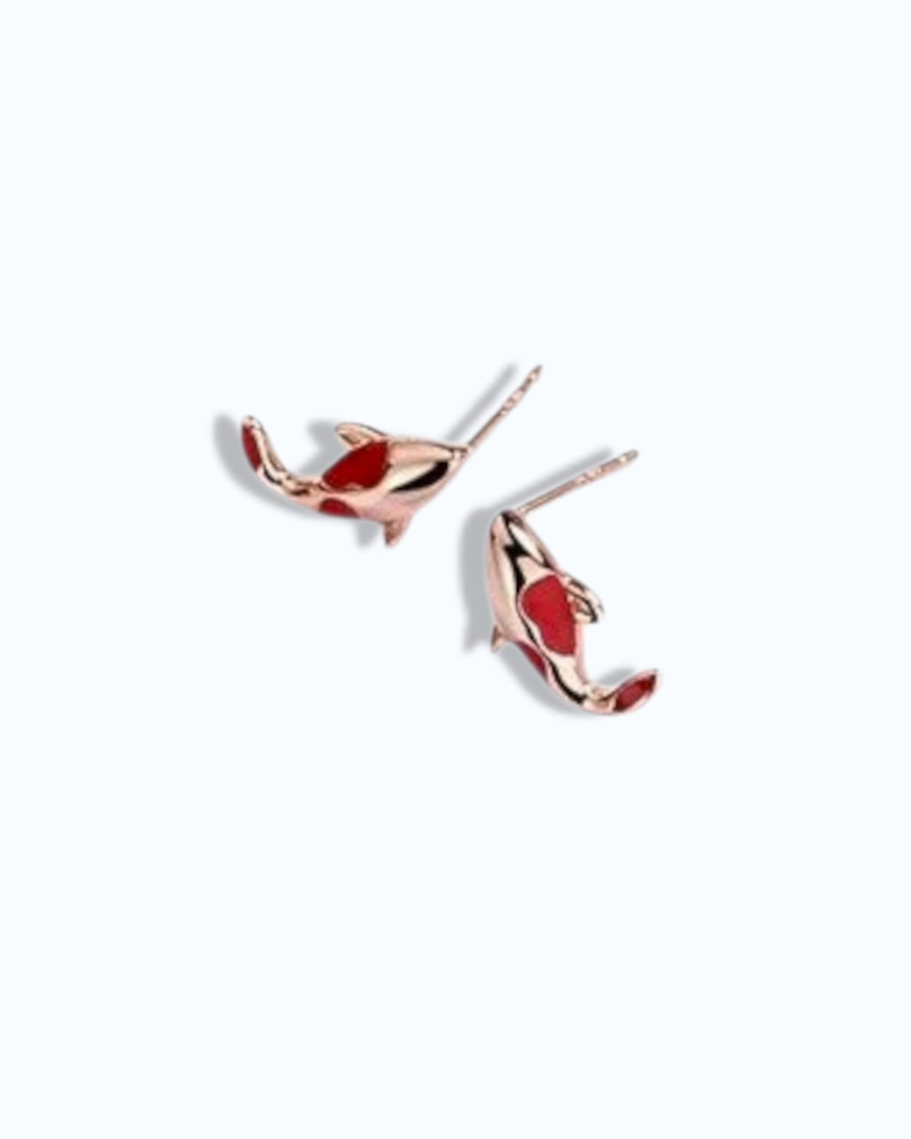 Pearlystones koi fish jewelry set featuring a rose gold necklace, red cord bracelet, and matching koi earrings.