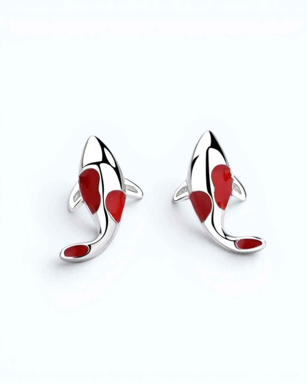 Pearlystones koi fish stud earrings in silver with vibrant red enamel detailing on a clean white background