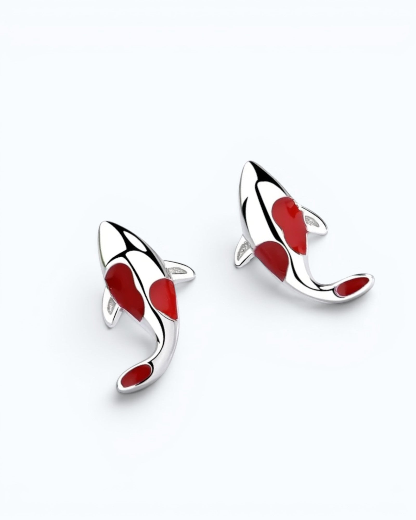 Pearlystones koi fish stud earrings in polished silver with vibrant red enamel detailing