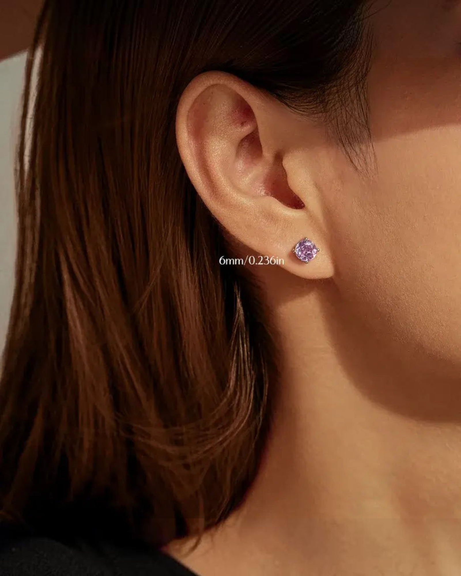 Pearlystones lavender octagonal rose cut zircon stud earring in rhodium-plated sterling silver worn on earlobe