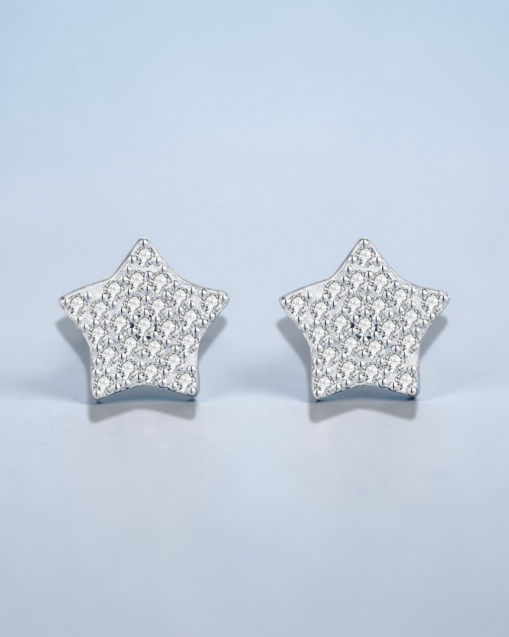 0.2 Ct Moissanite Star Stud crafted from sterling silver with sparkling moissanite in star shape.