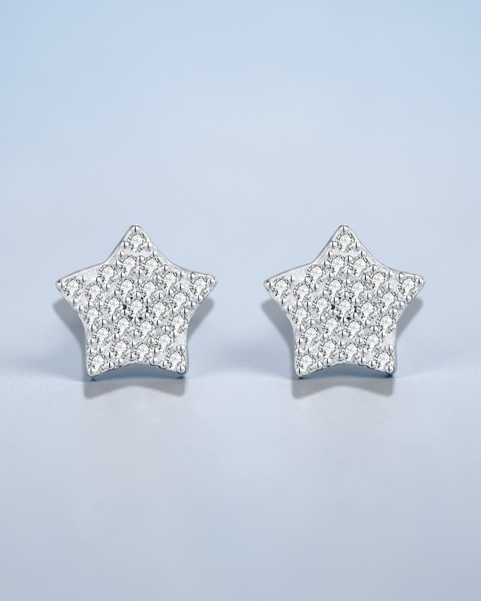 0.2 Ct Moissanite Star Stud crafted from sterling silver with sparkling moissanite in star shape.