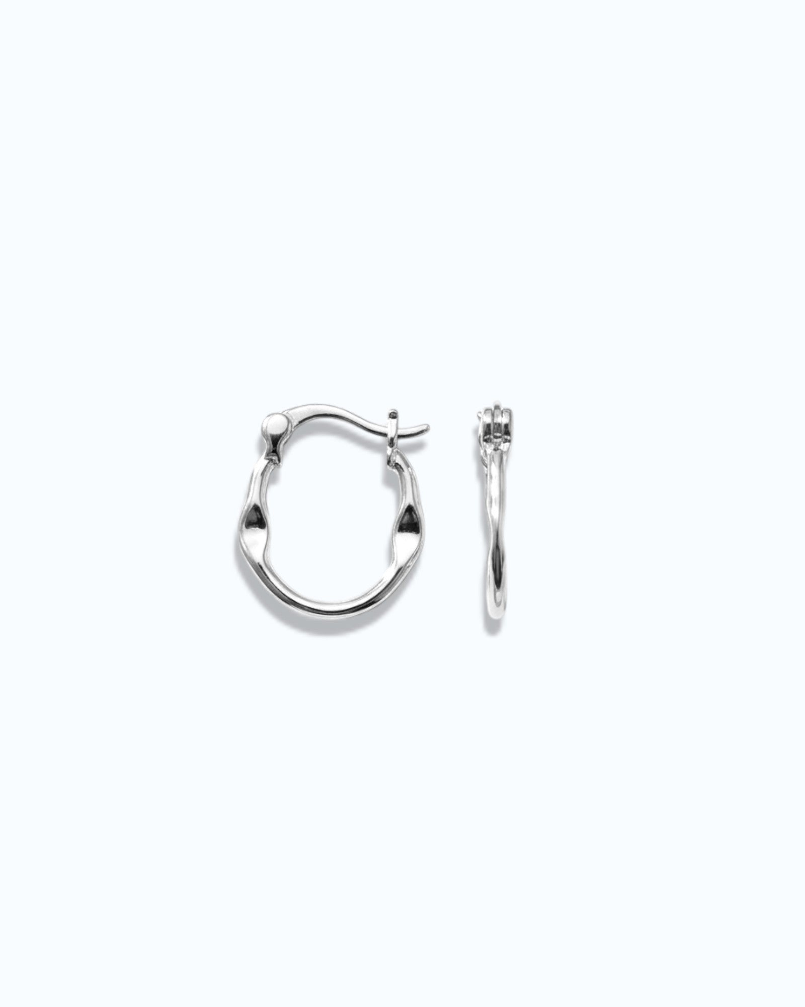 Pearlstones medium silver hoop earrings with a molten, undulating texture and hinged creole closure.