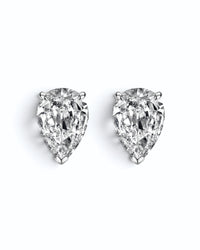 Pearlystones white water droplet stud earrings featuring brilliant pear-cut cubic zirconia in a minimalist setting.
