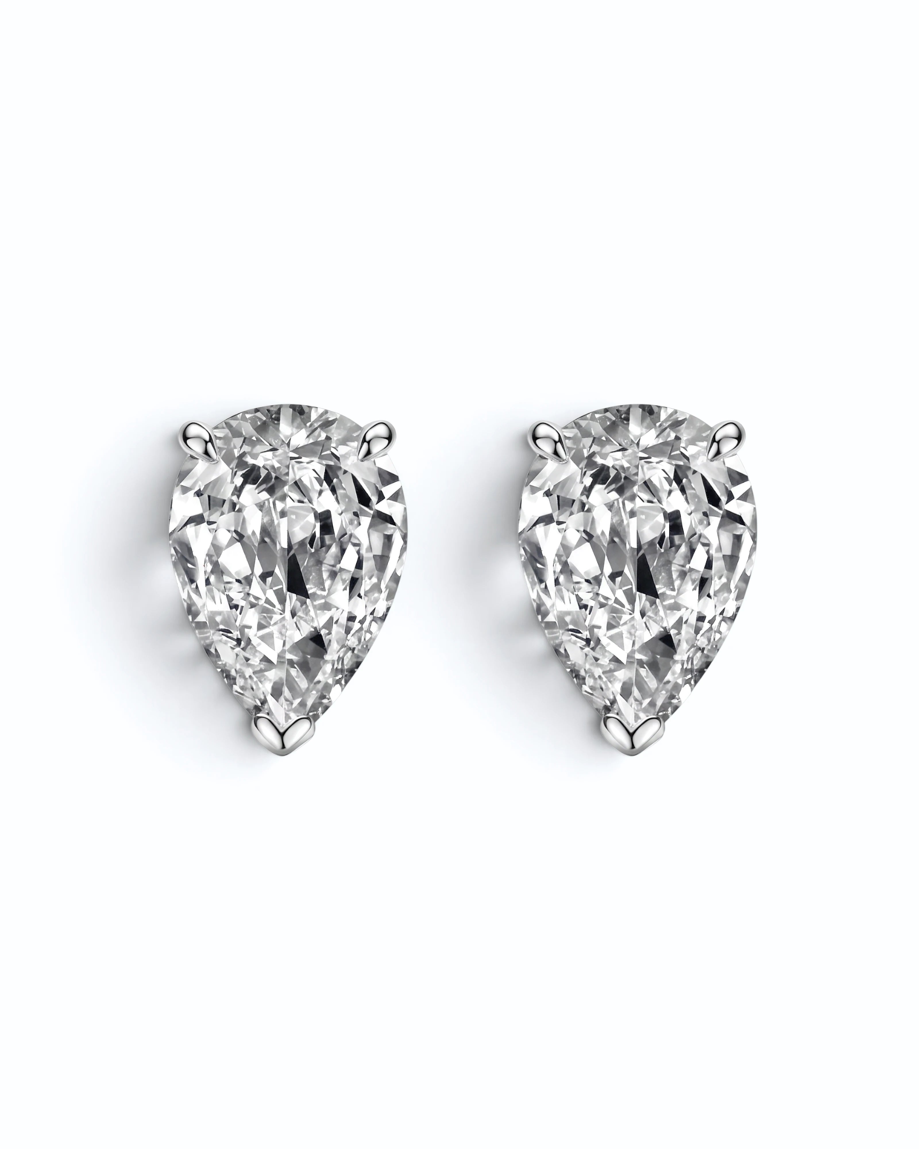 Pearlystones white water droplet stud earrings featuring brilliant pear-cut cubic zirconia in a minimalist setting.