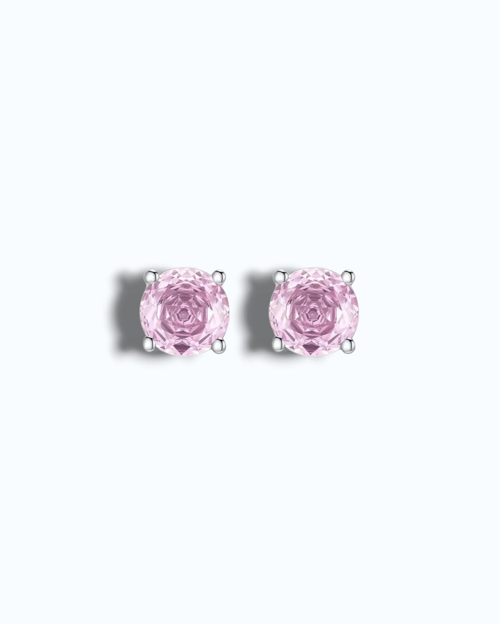Pearlystones rhodium-plated sterling silver stud earrings with octagonal rose cut pink zircon stones.