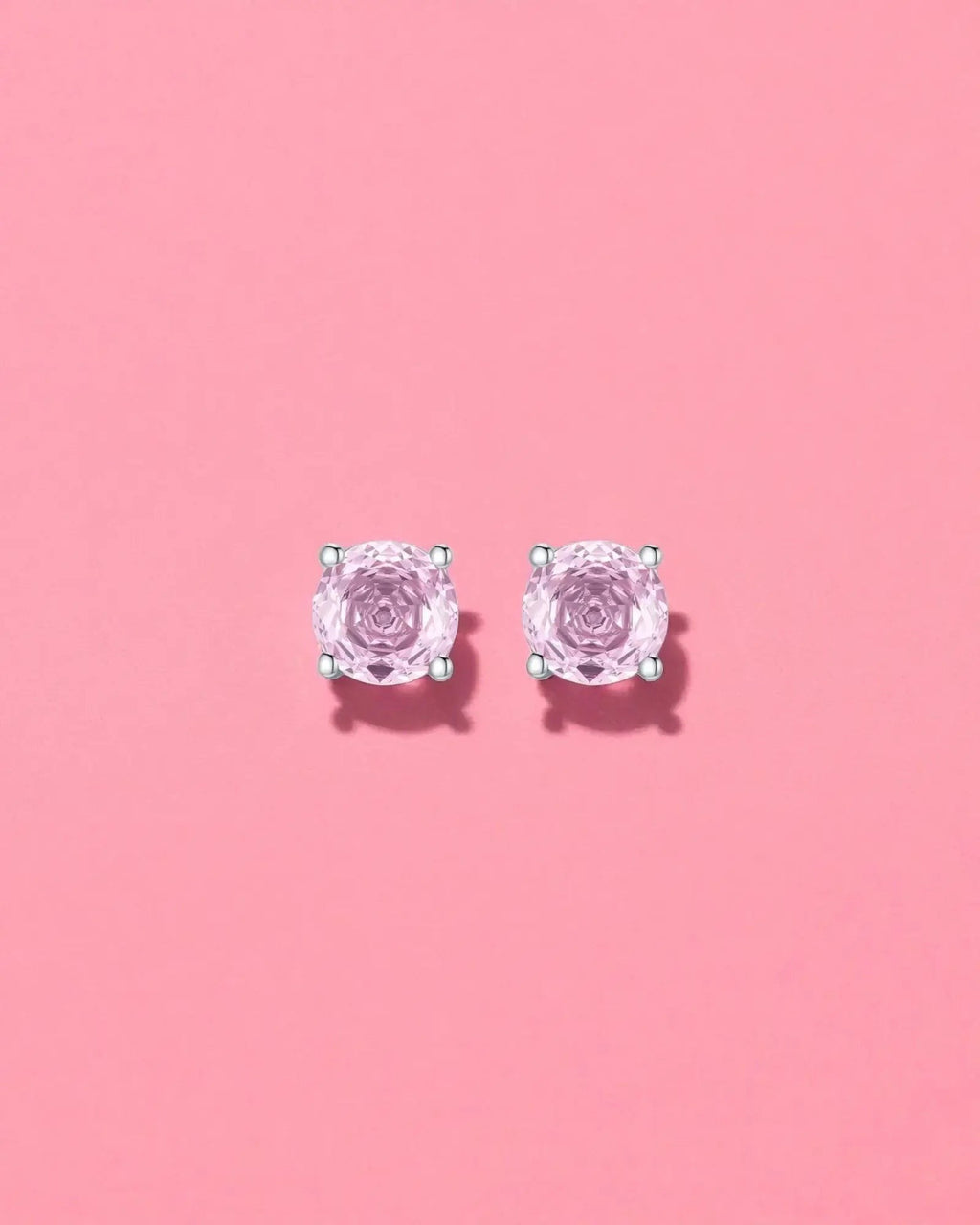 Pearlystones Octagonal Rose Cut Pink Zircon Stud Earrings in rhodium-plated sterling silver. Features a rose-cut pink zirconium stone.