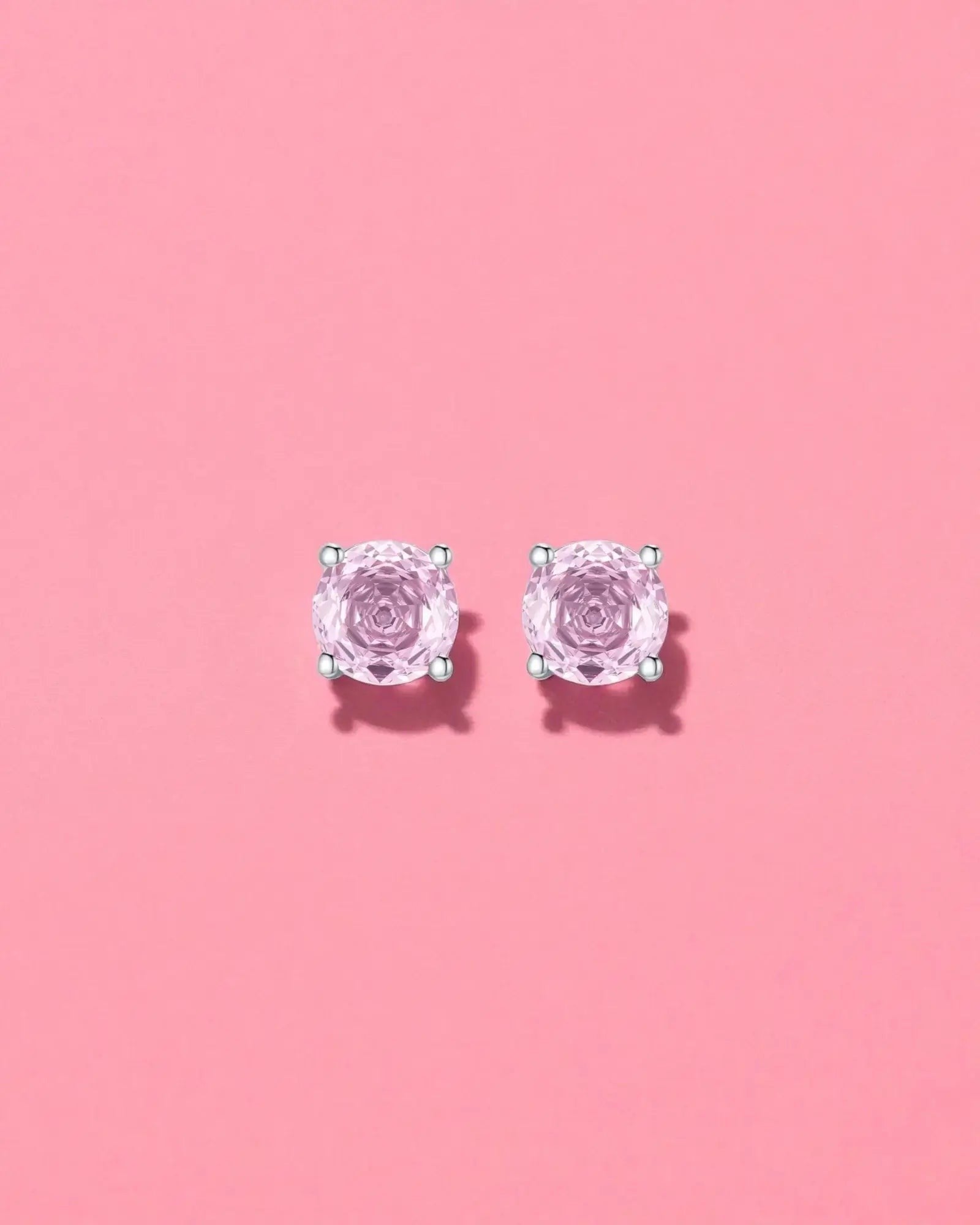 Pearlystones Octagonal Rose Cut Pink Zircon Stud Earrings in rhodium-plated sterling silver. Features a rose-cut pink zirconium stone.