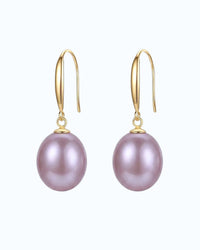 pearlystones Classic Purple Pearl Drop Earrings with gold-tone hooks. Lustrous pearls in a delicate purple hue.