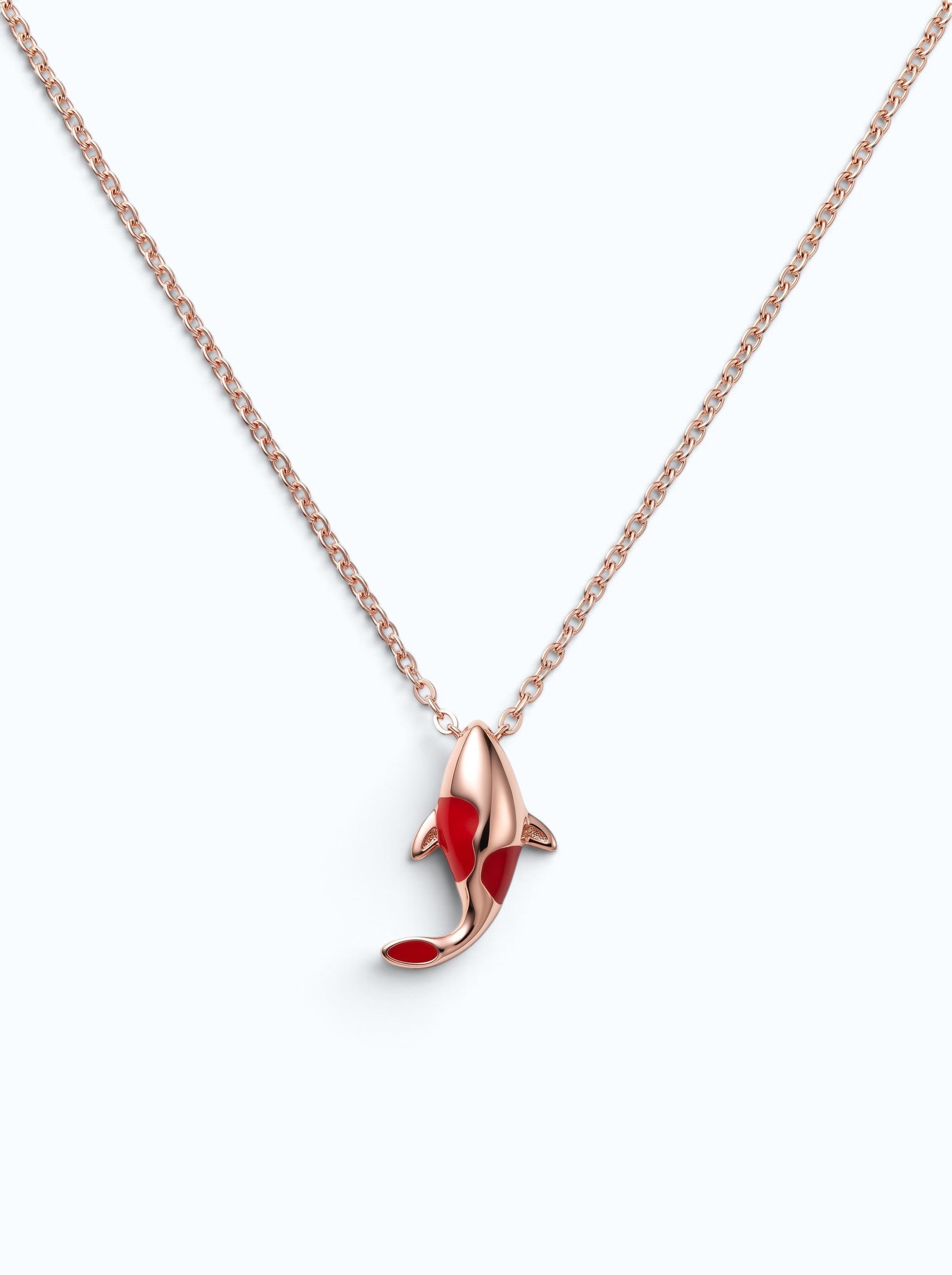 Pearlystones rose gold koi fish pendant necklace with vibrant red enamel detailing on a delicate chain