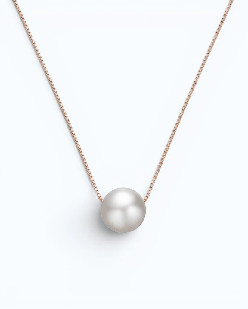 Pearlystones rose gold floating freshwater pearl necklace on a delicate sterling silver chain.