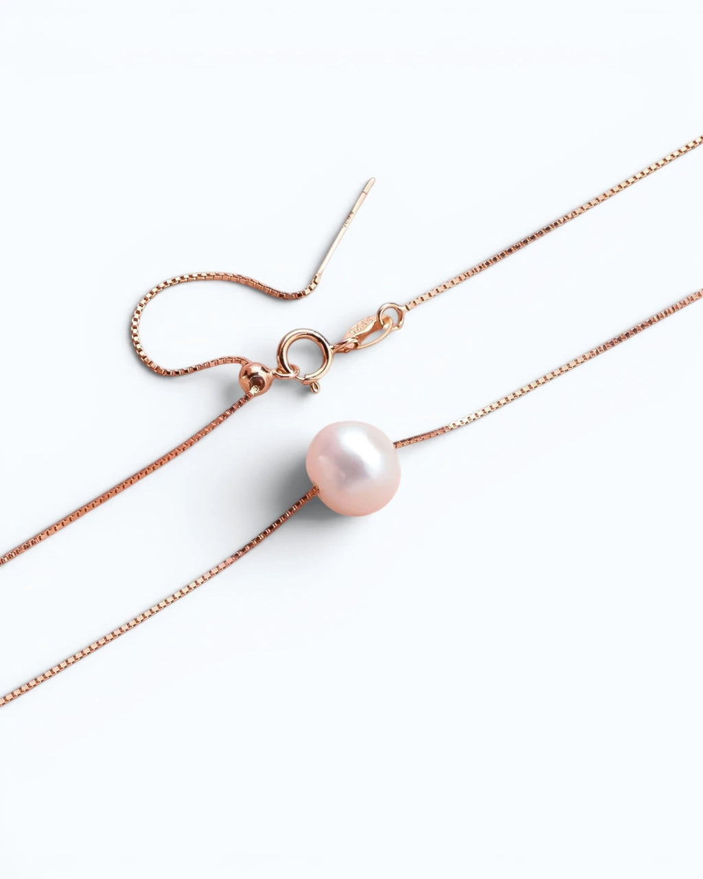 Pearlystones rose gold floating freshwater pearl necklace on a delicate sterling silver box chain.