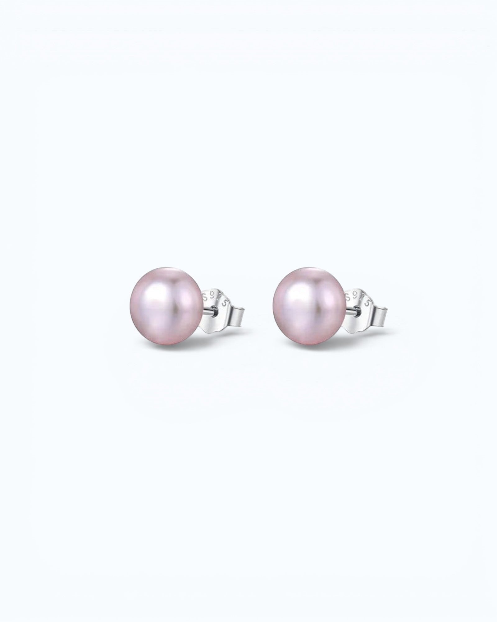 Pearlystones classic round purple pearl stud earrings with silver posts on a clean white background.