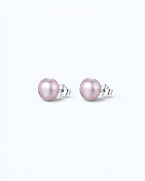 Pearlystones classic round purple pearl stud earrings with silver posts on a clean white background.