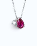 Pearlystones ruby red pear-shaped zircon pendant necklace with a delicate silver cable chain and accent stone.