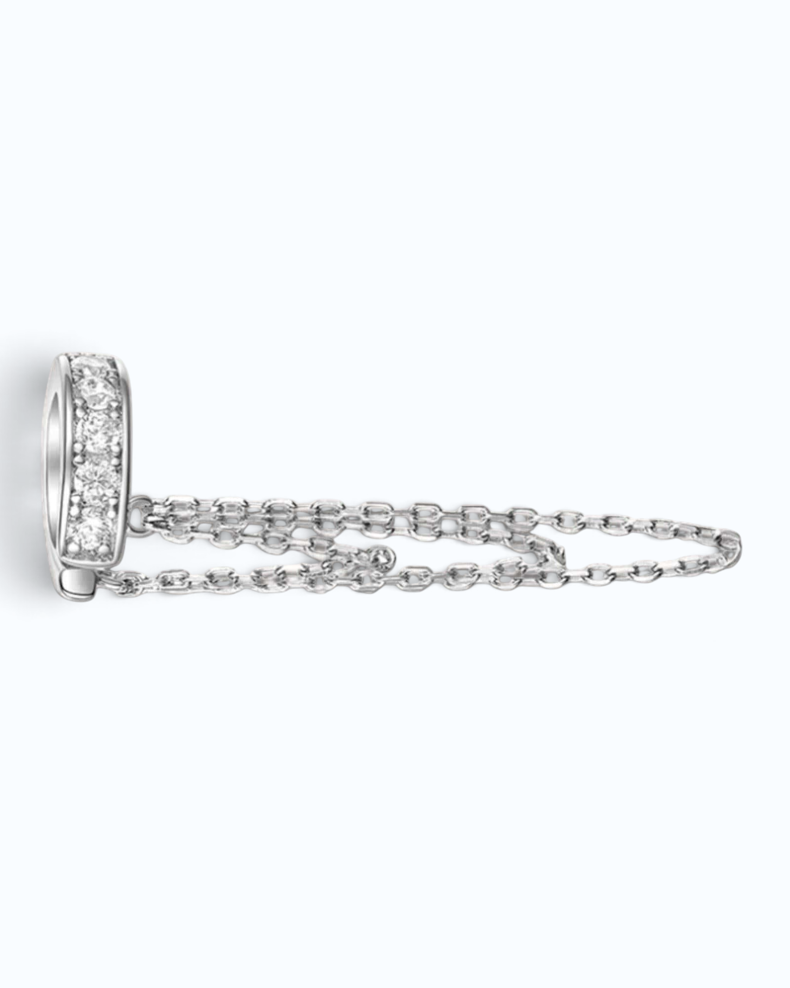 Pearlystones silver ear cuff featuring three delicate chains and a zircon-inlaid band for a layered look.
