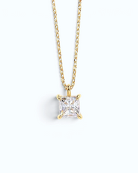 Pearlystones square zircon pendant necklace featuring a sparkling clear stone on a delicate gold chain.