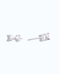 Pearlystones sterling silver bow stud earrings with white gold plating and clear cubic zirconia.