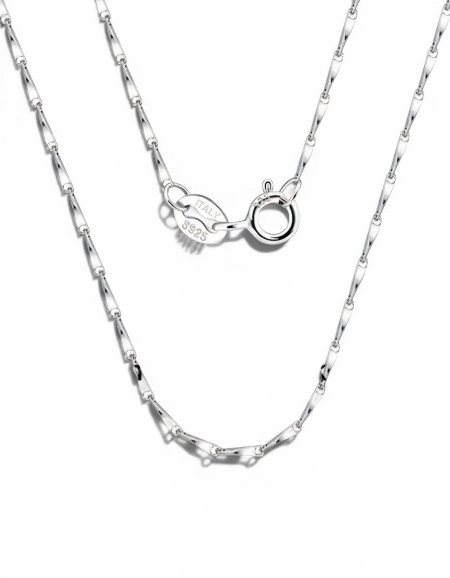 Pearlystones sterling silver necklace featuring twisted dapped bar links and a secure spring ring clasp.