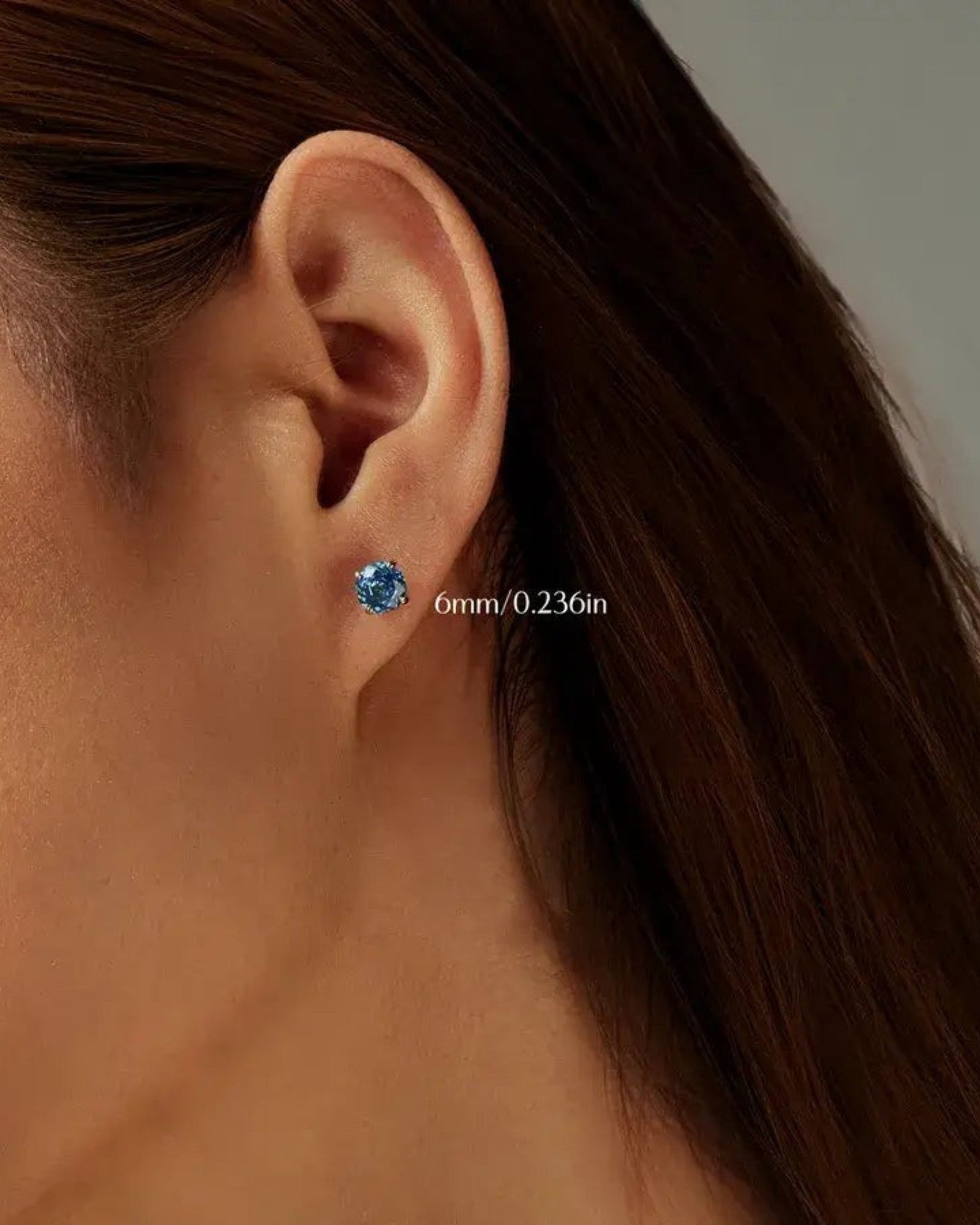 Pearlstones Octagonal rose cut tanzanite blue zircon stud earring in rhodium-plated sterling silver, 6mm.