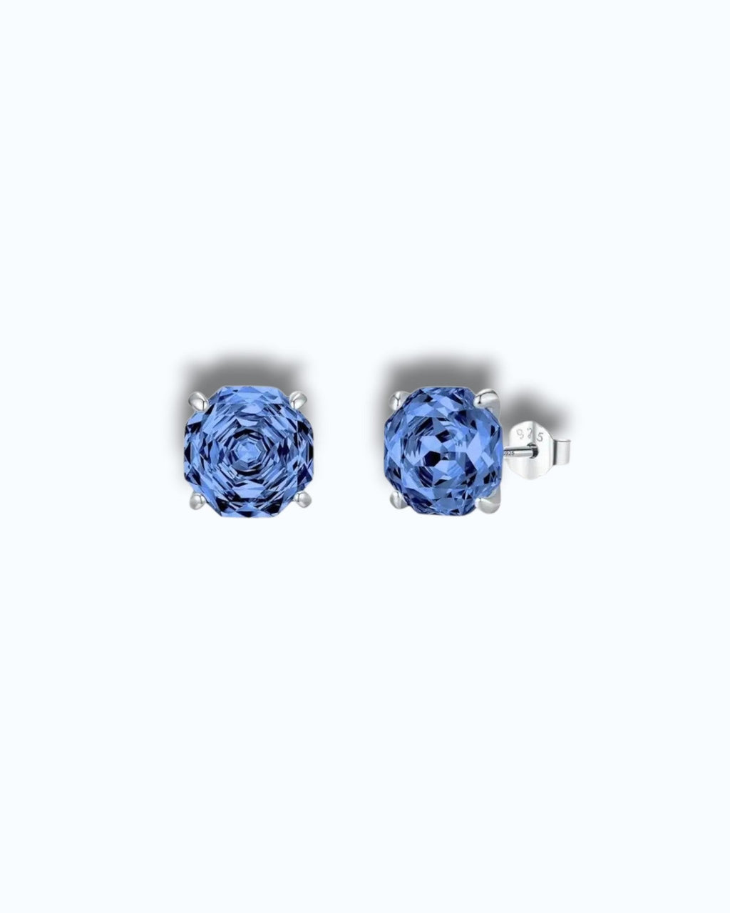 Pearlystones Octagonal rose cut tanzanite blue zircon stud earrings in rhodium-plated sterling silver.