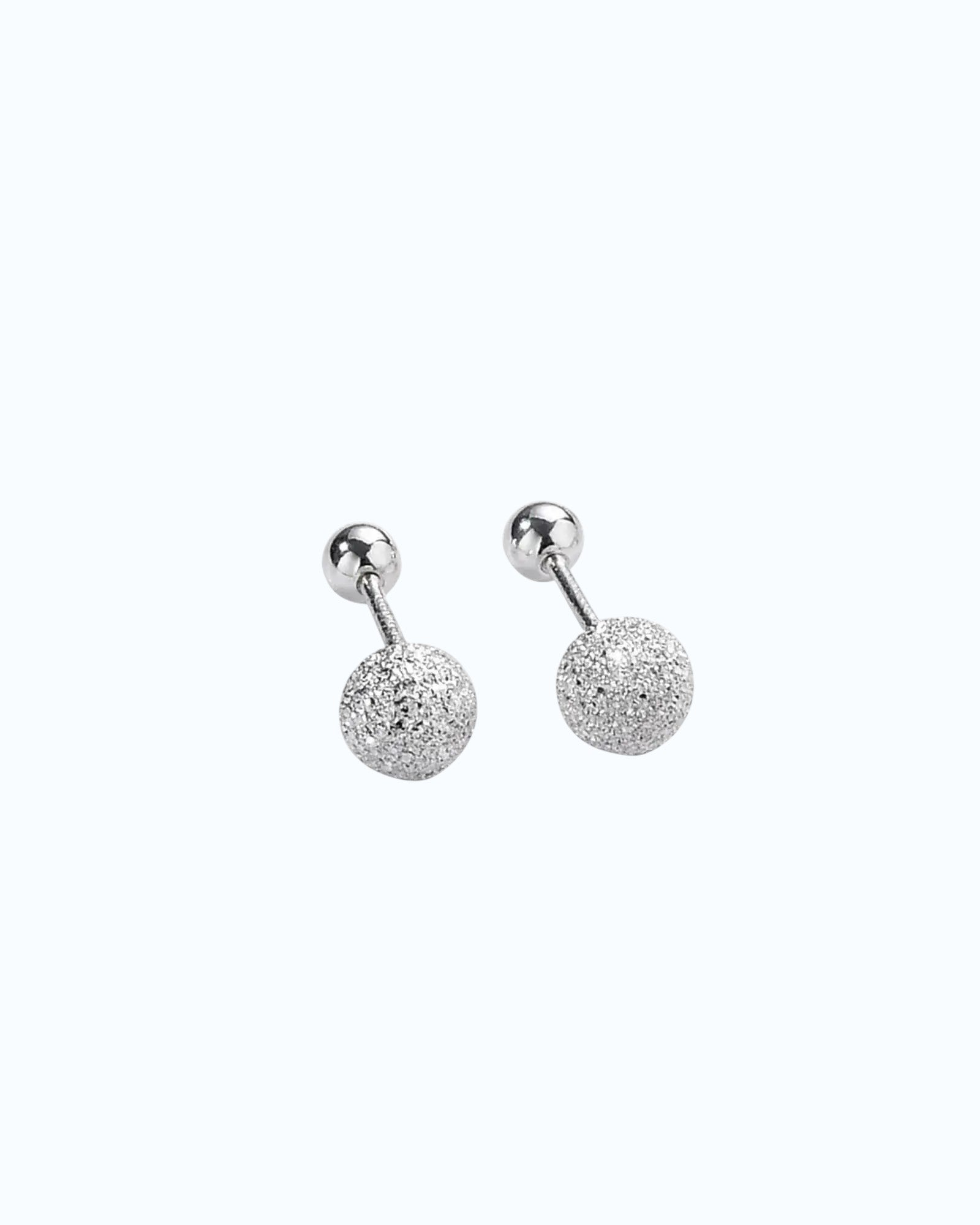 Pearlystones sterling silver textured ball stud earrings with frosted finish and ball back closure.