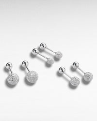 Pearlystones silver textured ball stud earrings with frosted finish and ball back closure.