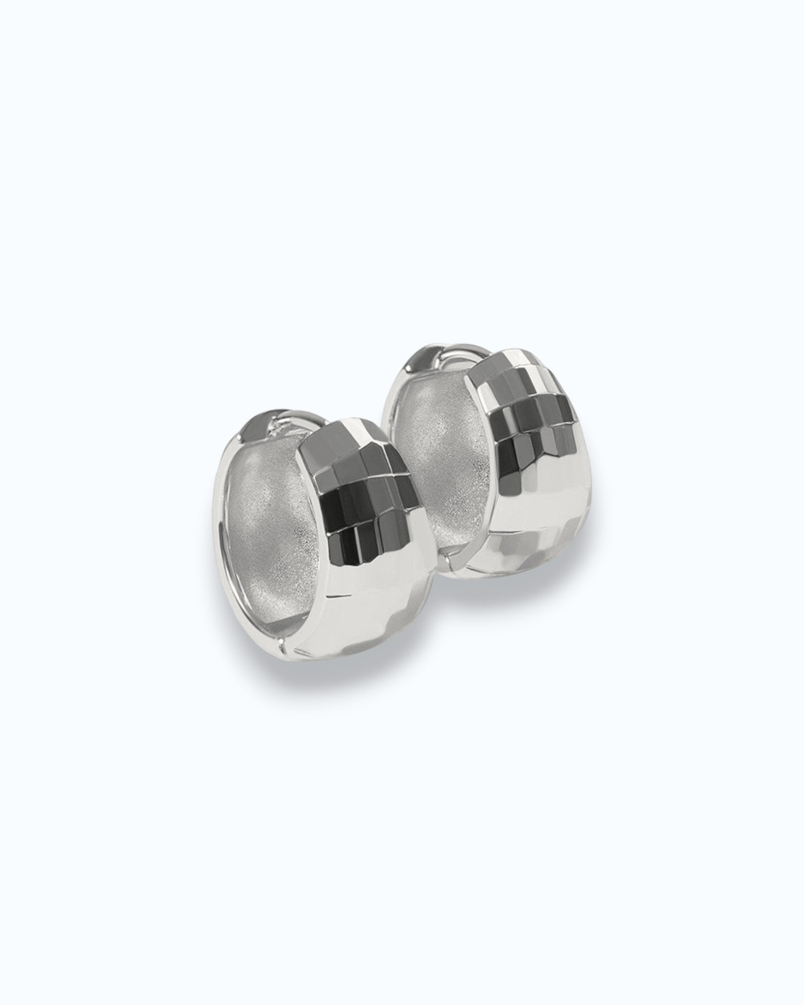 Pearlystones silver-tone sterling silver huggie hoop earrings with geometric texture.
