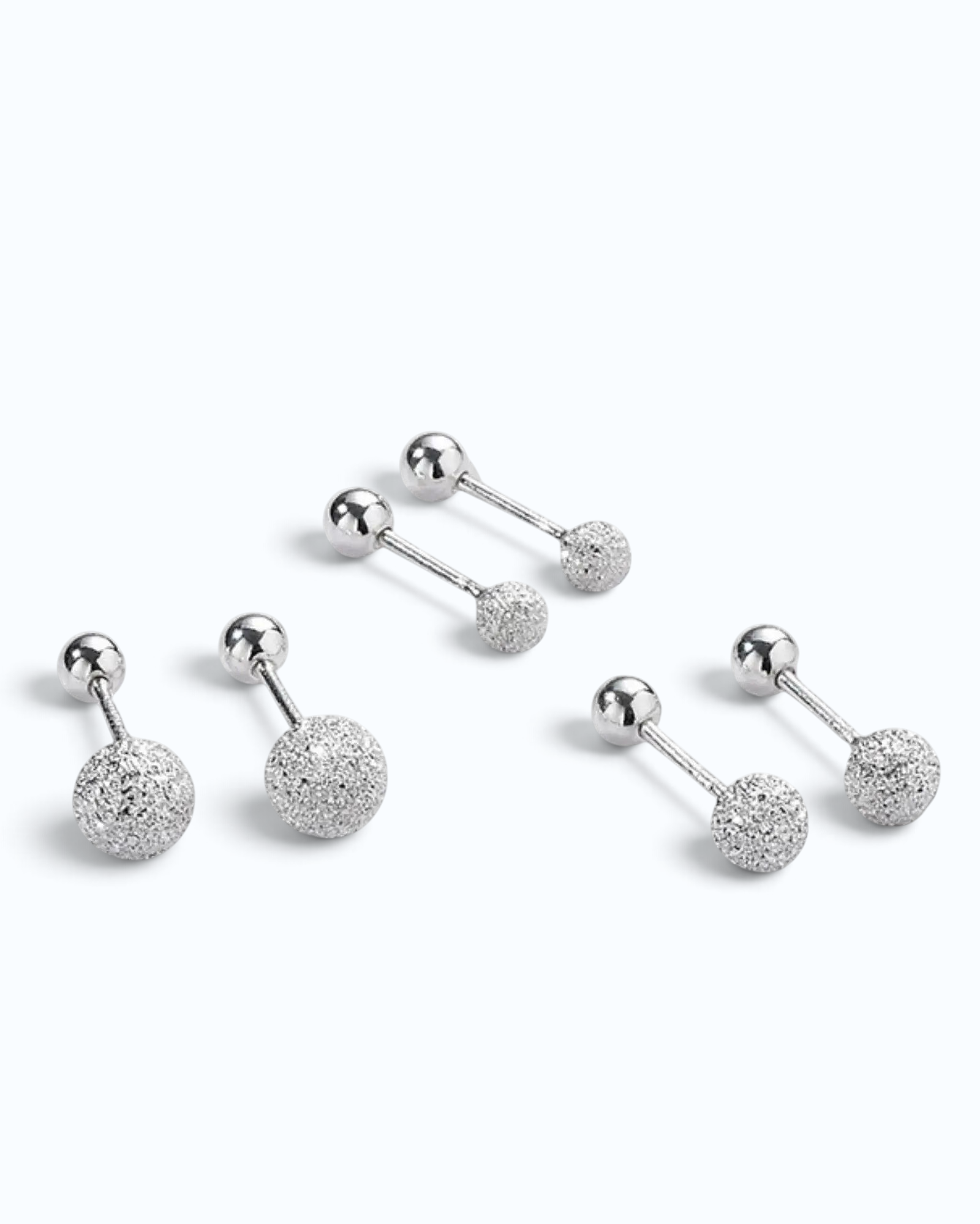Pearlystones sterling silver ball stud earrings with a textured frosted finish and secure ball back closures.